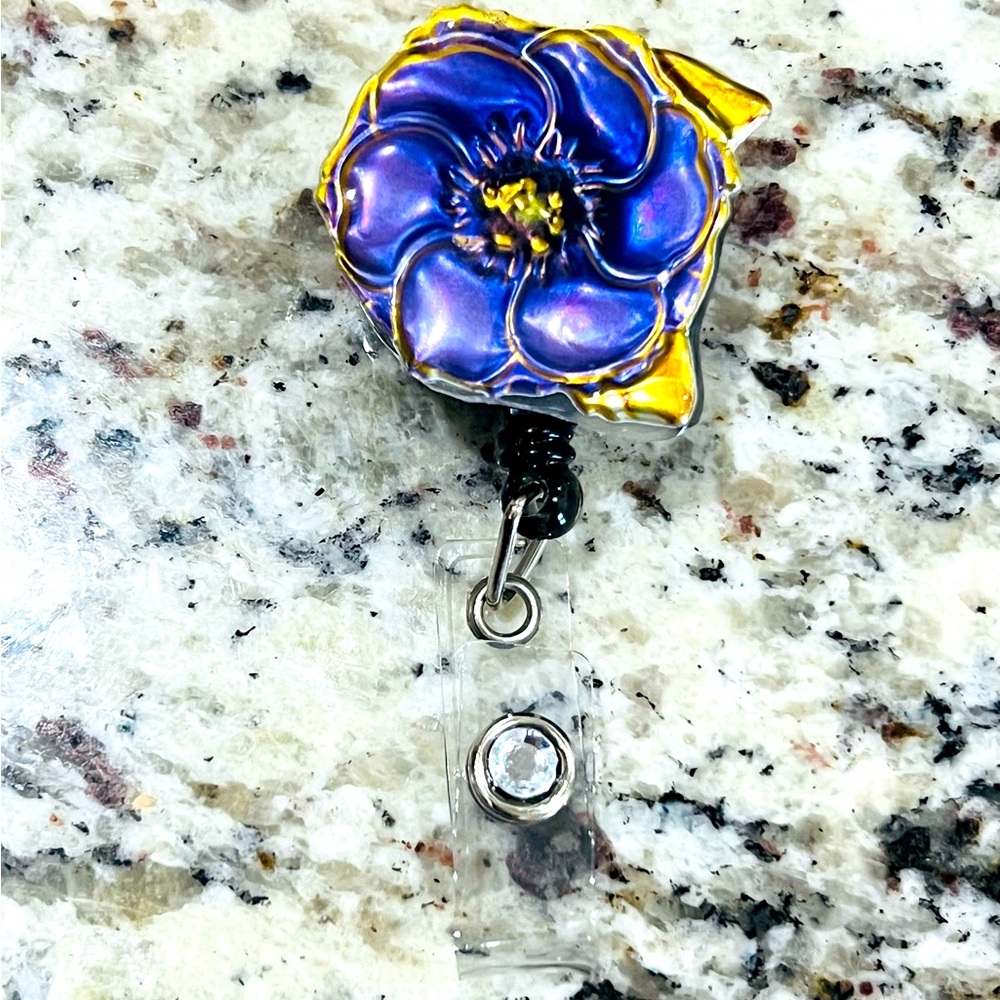 Flower badge reel. Badge pull.